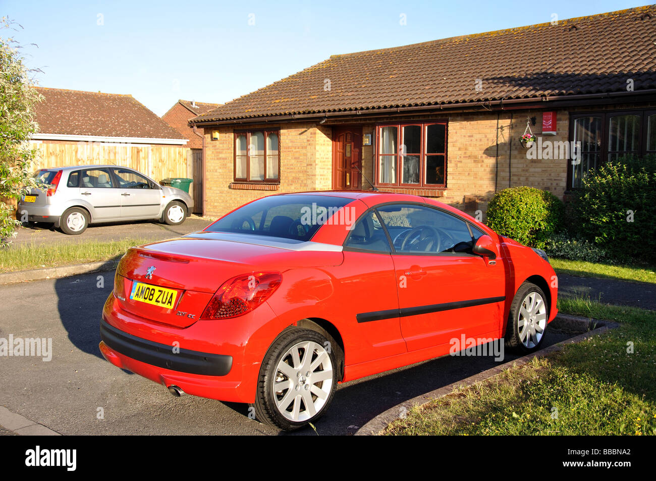 Car outside house, Stanwell Moor, Surrey, England, United Kingdom Stock Photo