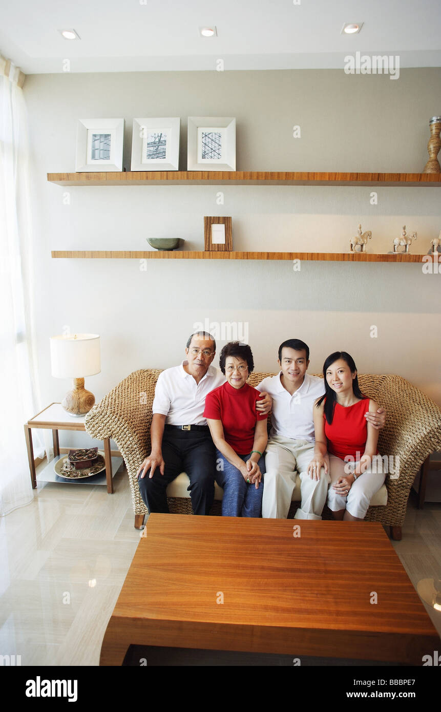 Black family sitting around a table hi-res stock photography and images ...
