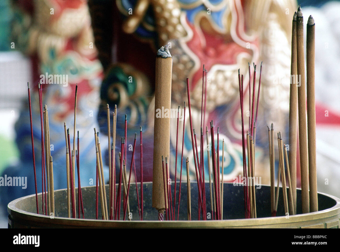 Joss sticks in temple urn hi-res stock photography and images - Alamy