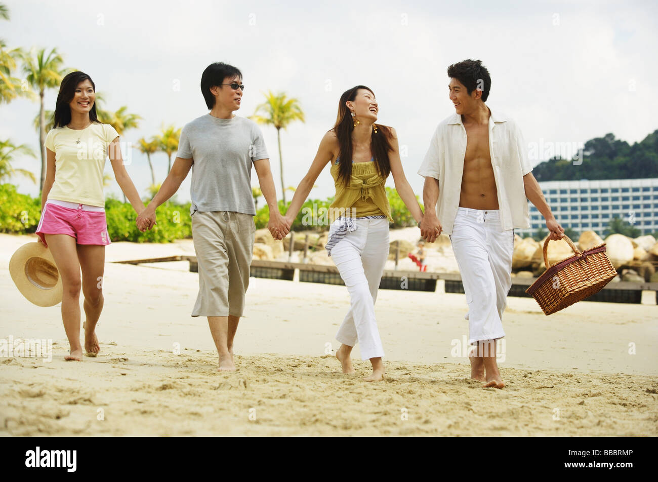 Holding hands on beach hi-res stock photography and images - Alamy
