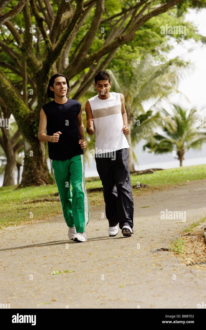 Indian men running in park hi-res stock photography and images - Alamy