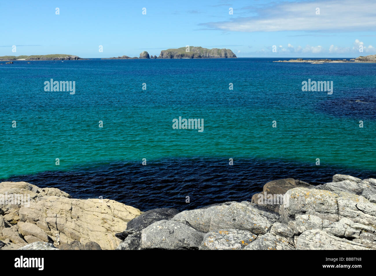 Bosta beach and bay on Great Bernera looking out to the islands of Flodday, Old Hill and Bearasay Stock Photo