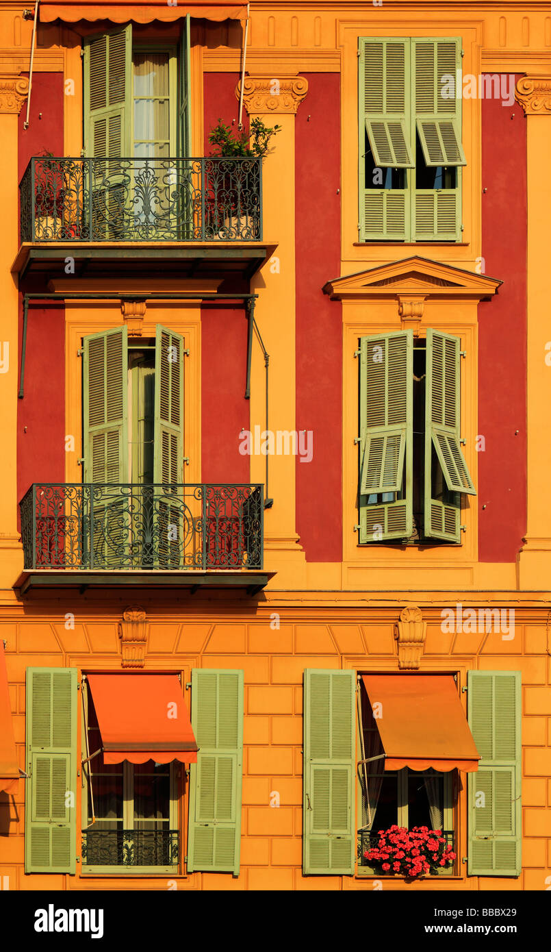 Typical French windows on residential building near the port in Nice France Stock Photo