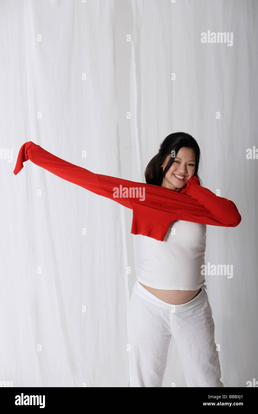 Young chinese woman in sweater hi-res stock photography and images - Alamy