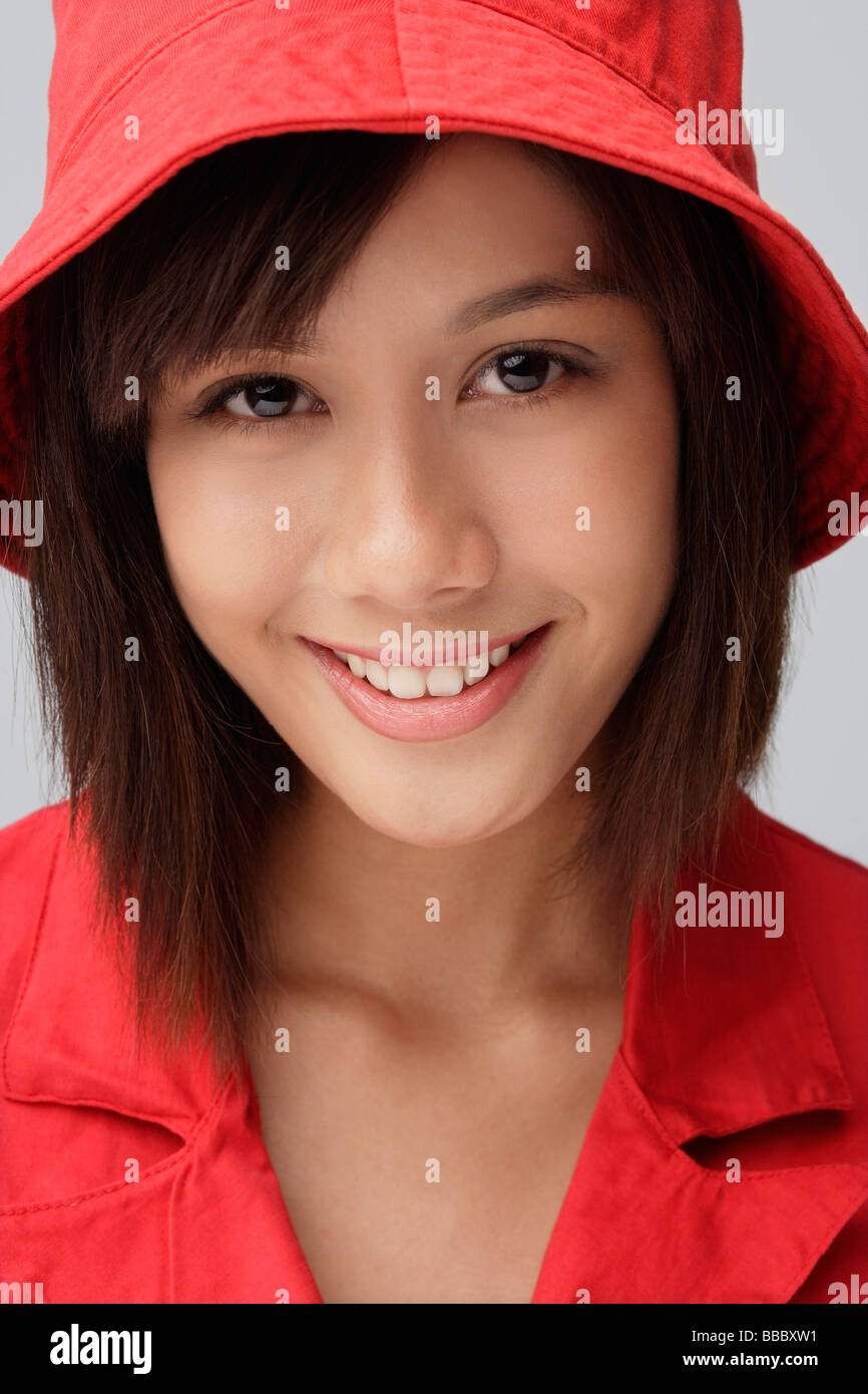 Young woman in red hat Stock Photo - Alamy