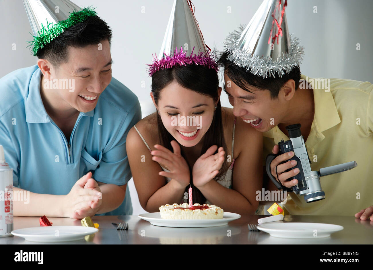 Friends celebrating birthday Stock Photo - Alamy