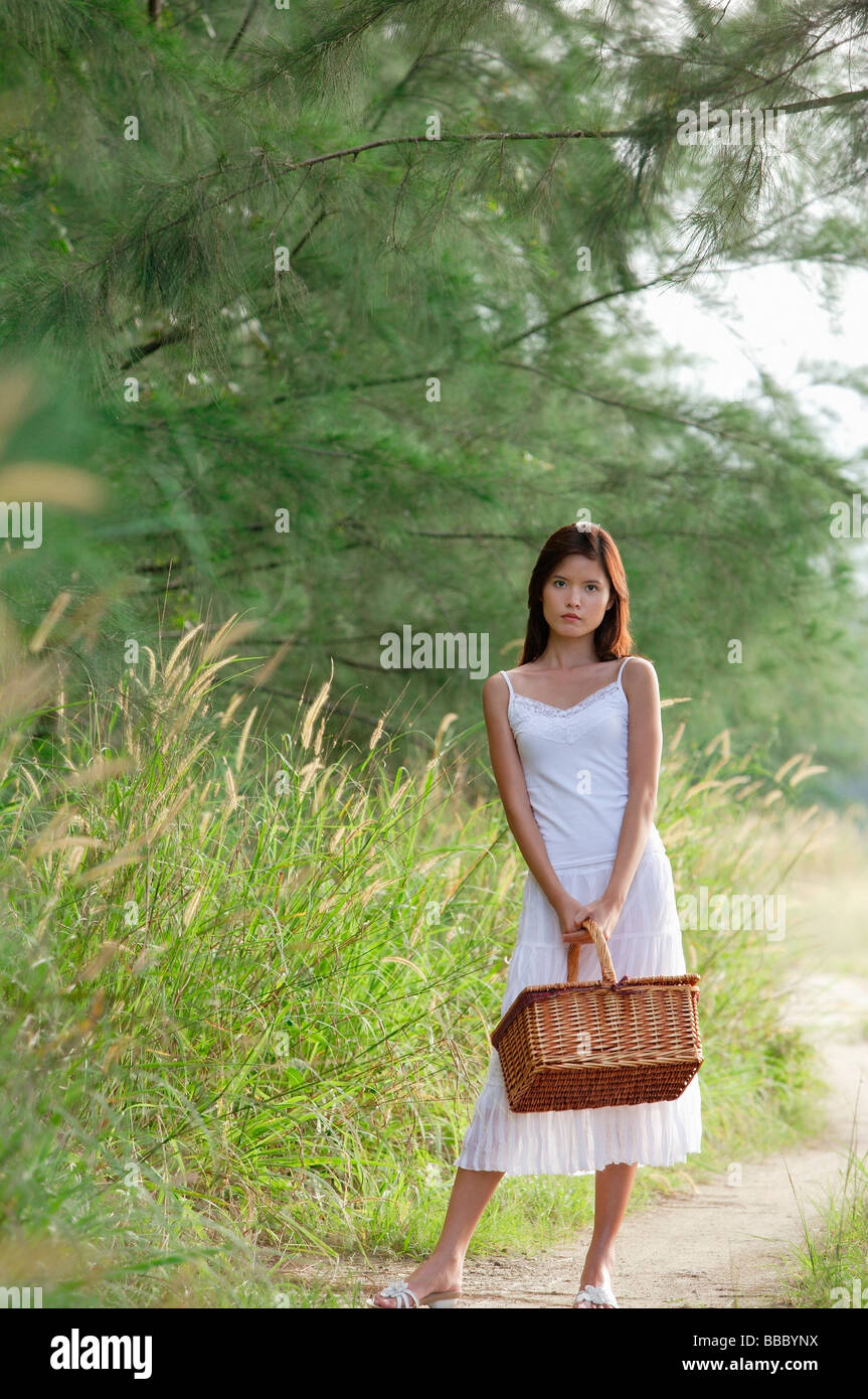 Woman wicker basket alone hi-res stock photography and images - Alamy