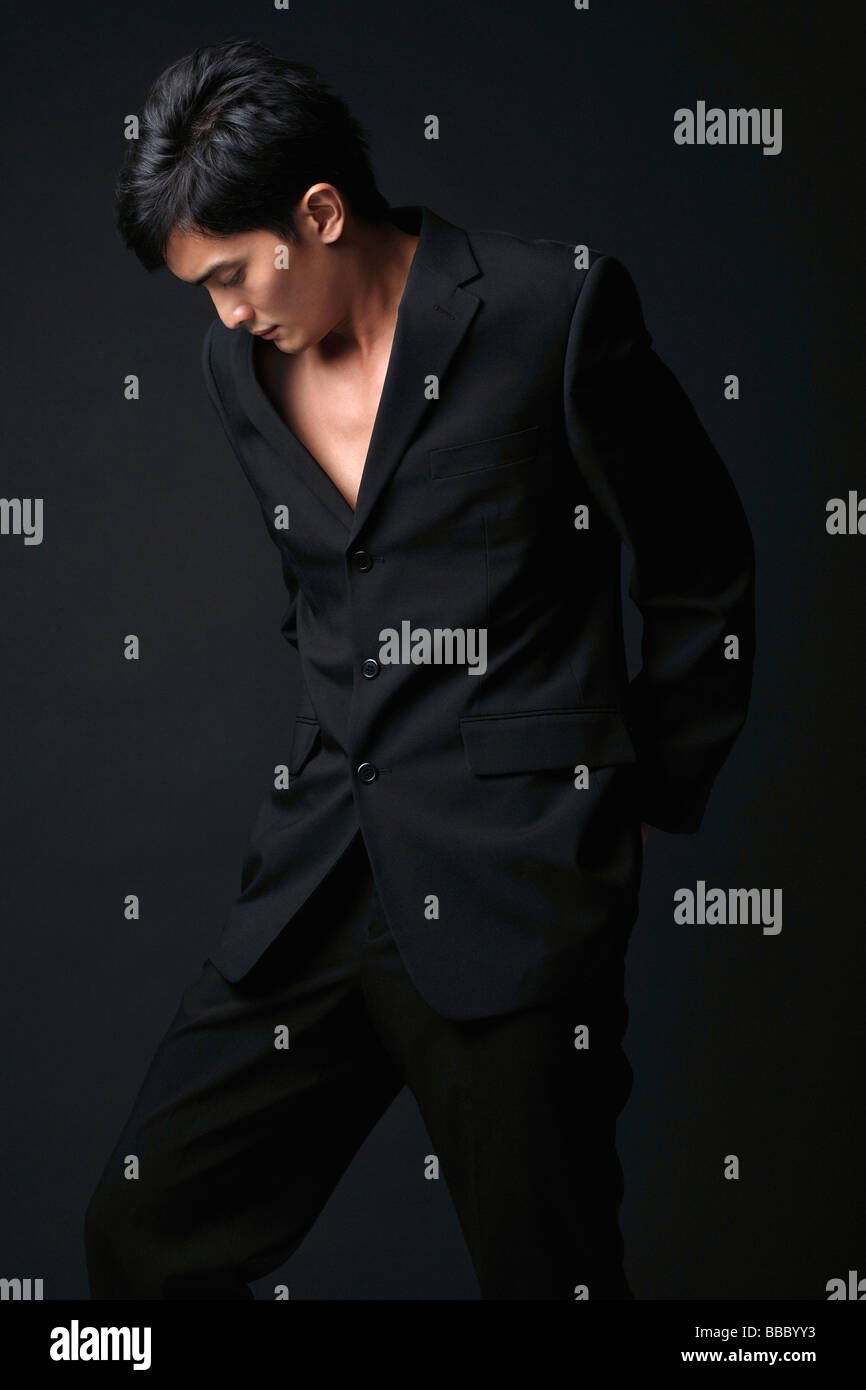 Black short suit hi-res stock photography and images - Alamy