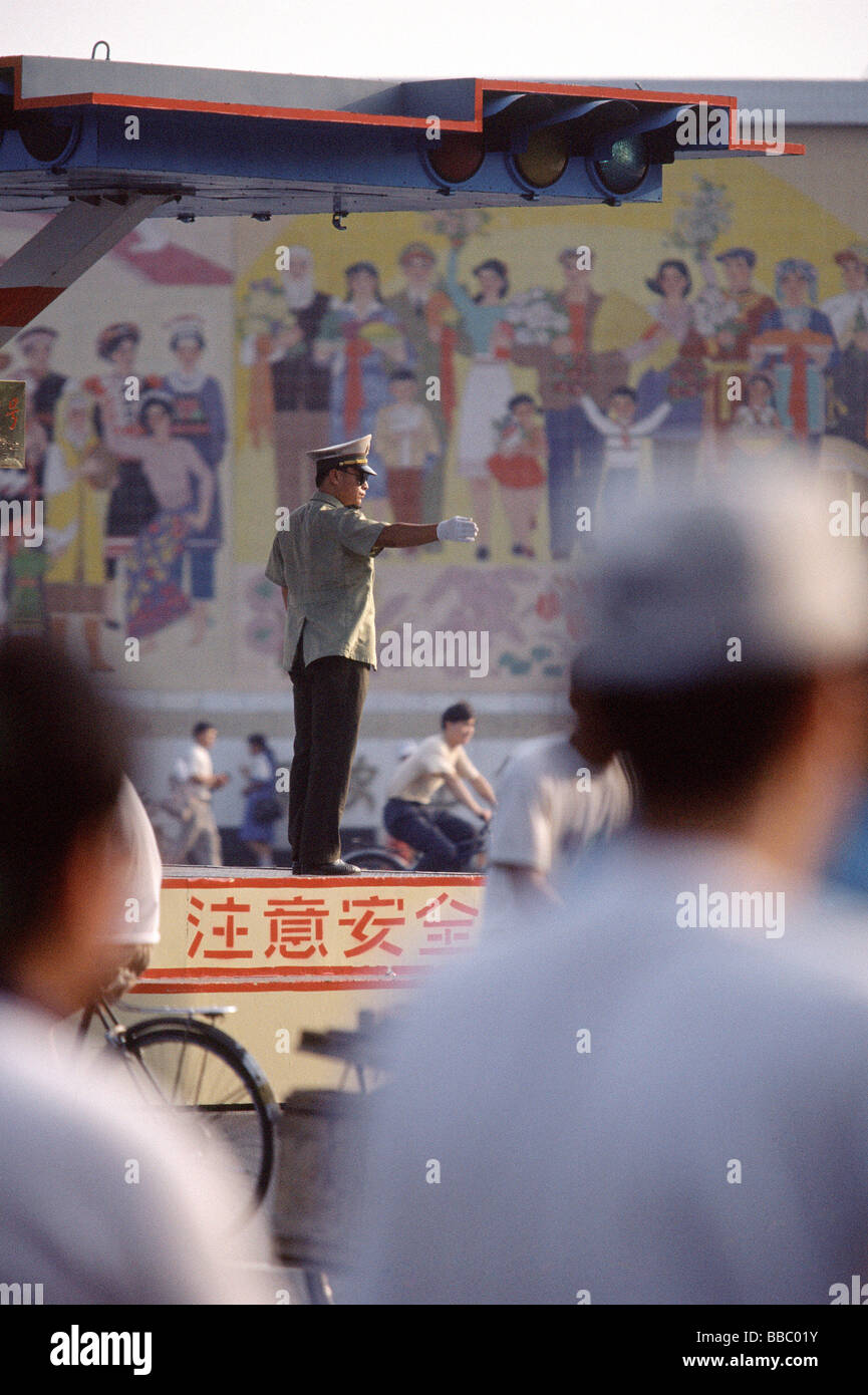 Chinese soldier directing traffic, Beijing Stock Photo