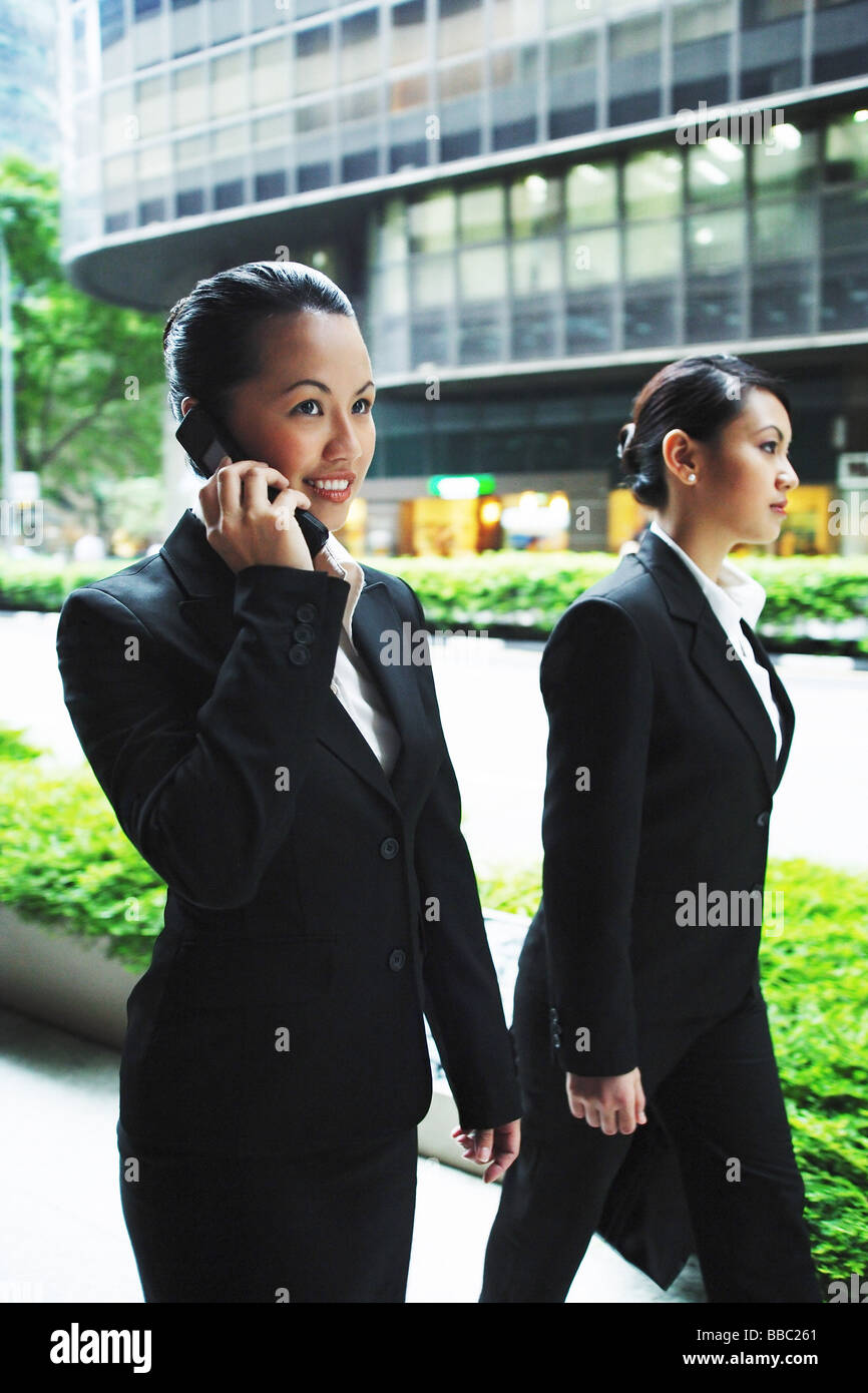Woman walking side view suit hi-res stock photography and images - Alamy