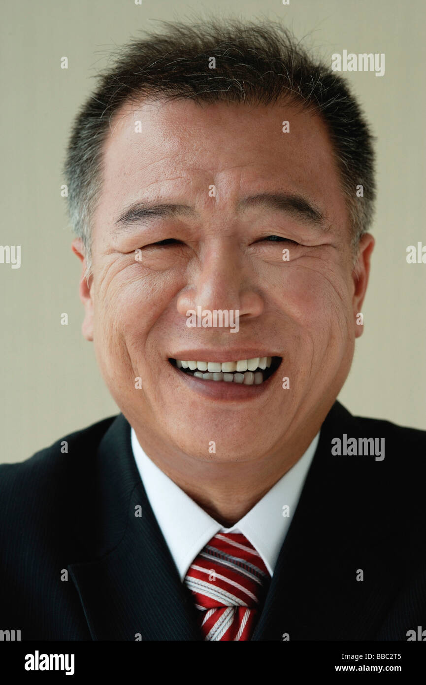 A man smiles at the camera Stock Photo - Alamy