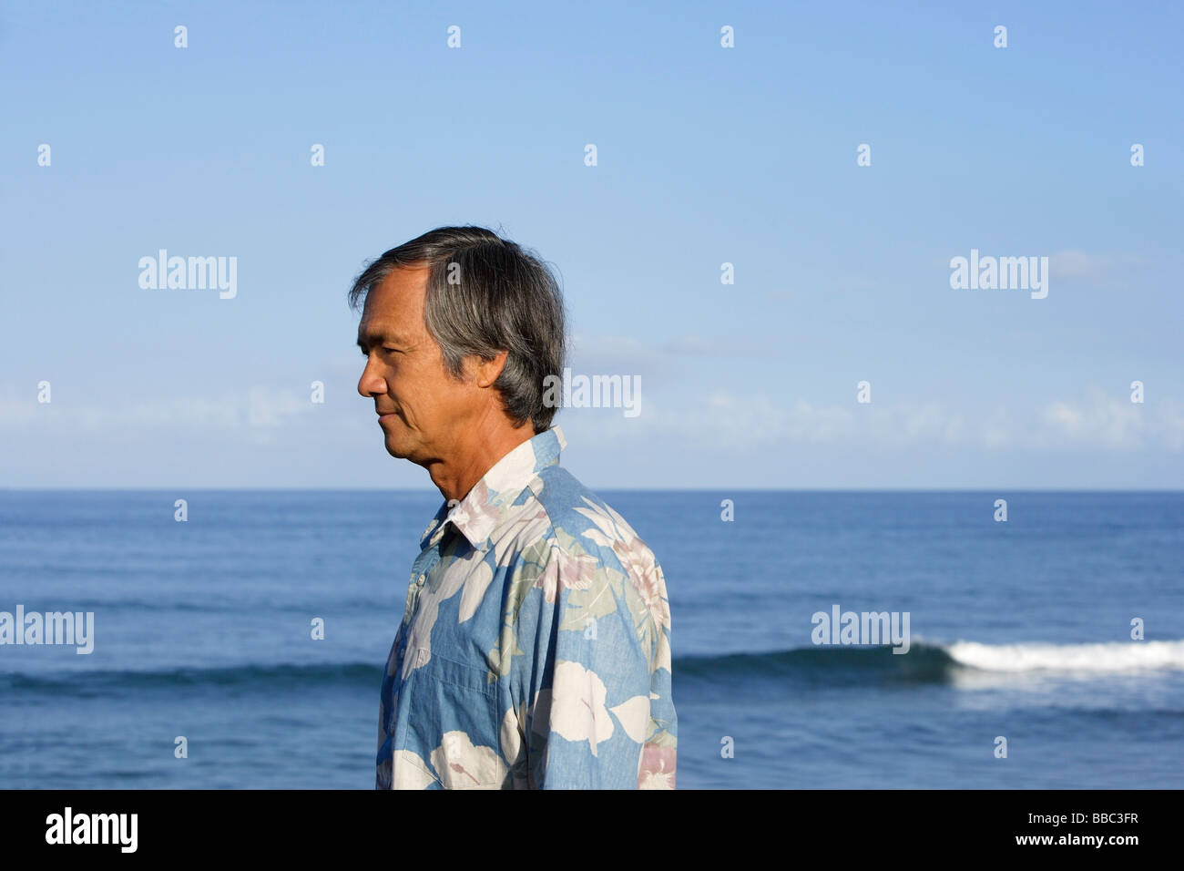 mature man looking out to sea Stock Photo - Alamy