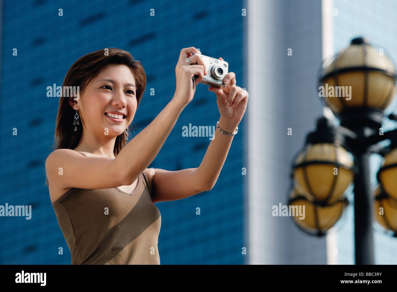 Woman taking a picture Stock Photo