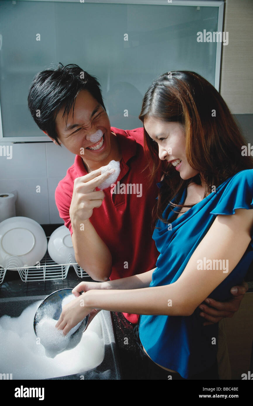 Adult washing dishes suds hi-res stock photography and images - Alamy