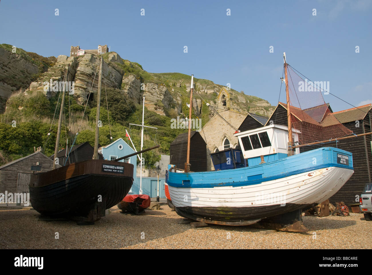 Fishing Boats outside fishing museum, Hastings, East Sussex, England UK Stock Photo