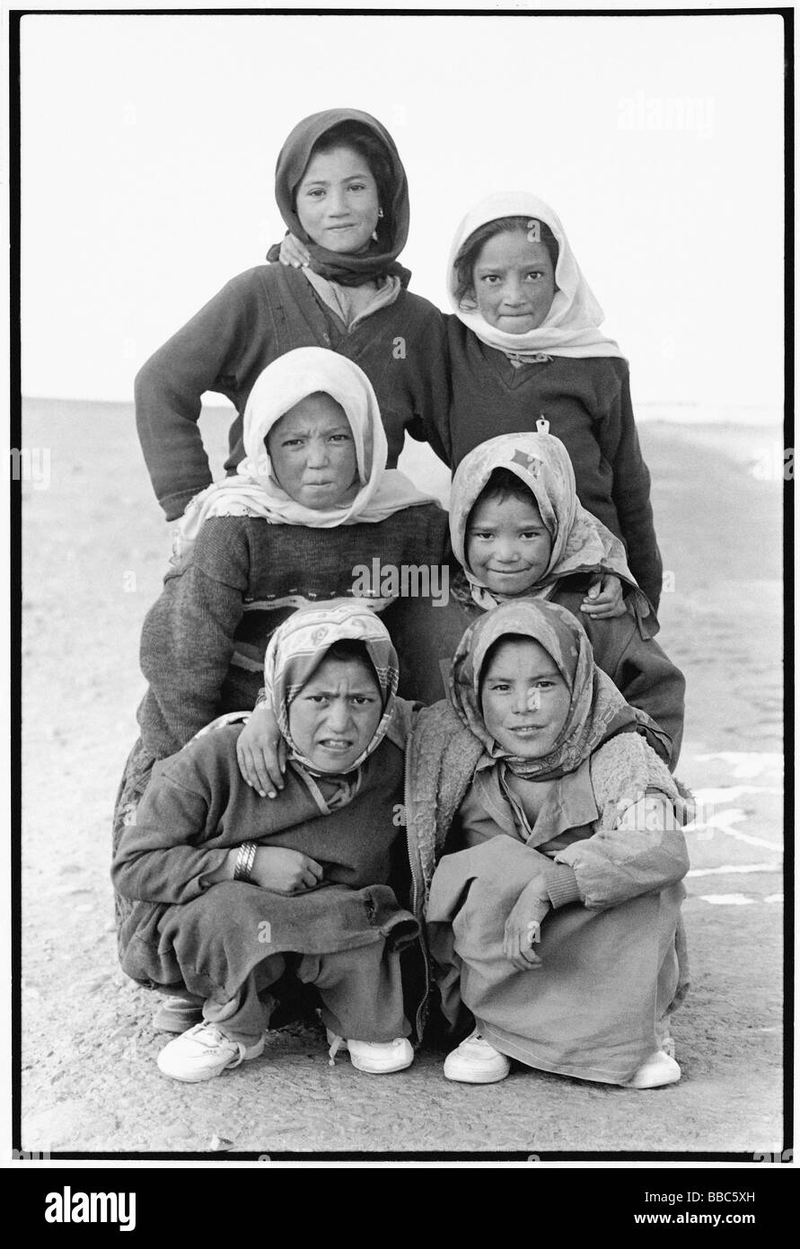 India, Ladakh, Portrait of young girls on their way home from school. Stock Photo