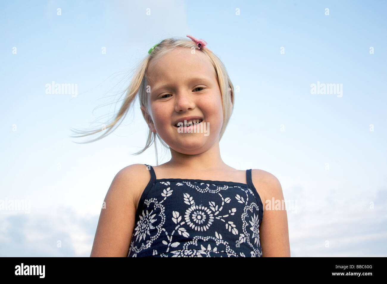 Portrait of little girl smiling Stock Photo - Alamy