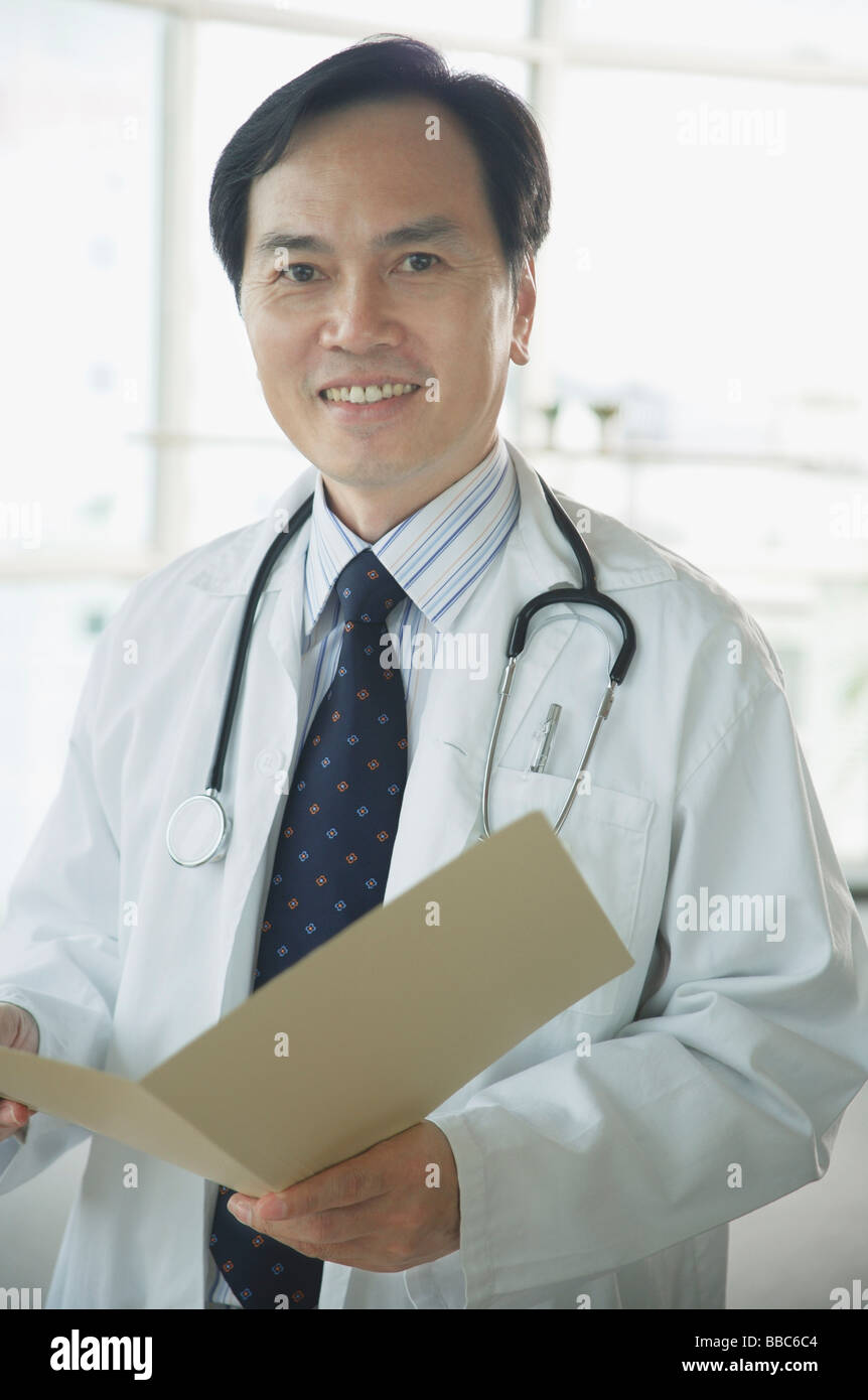 Mature adult doctor smiling camera hi-res stock photography and images ...