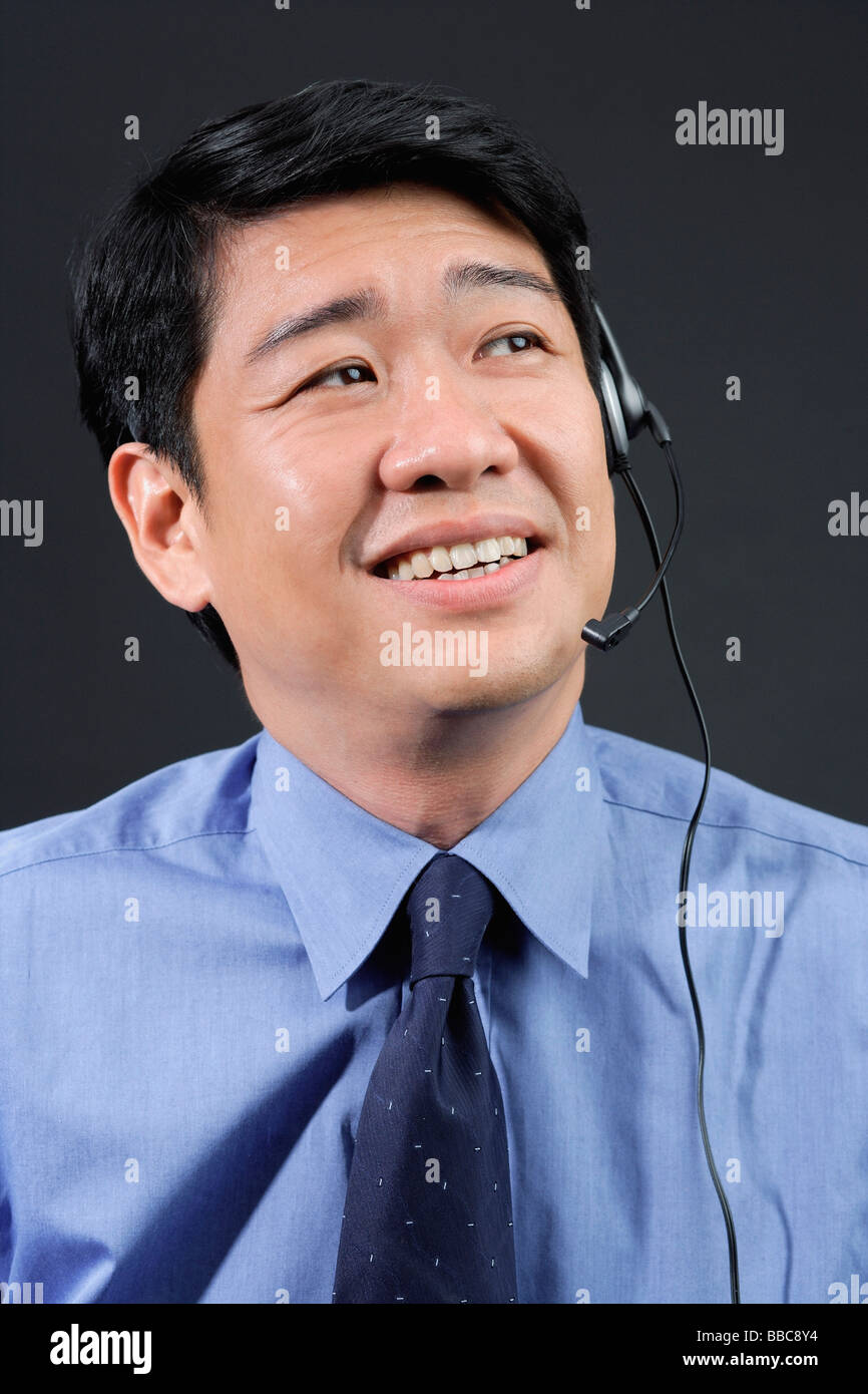 Businessman using hands free device Stock Photo Alamy