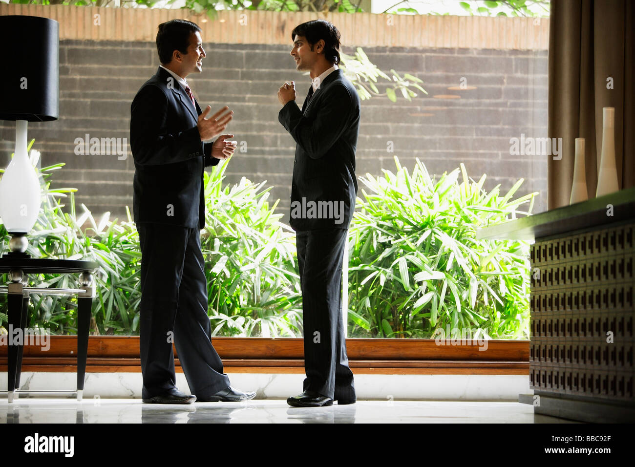 businessmen in hotel lobby Stock Photo - Alamy