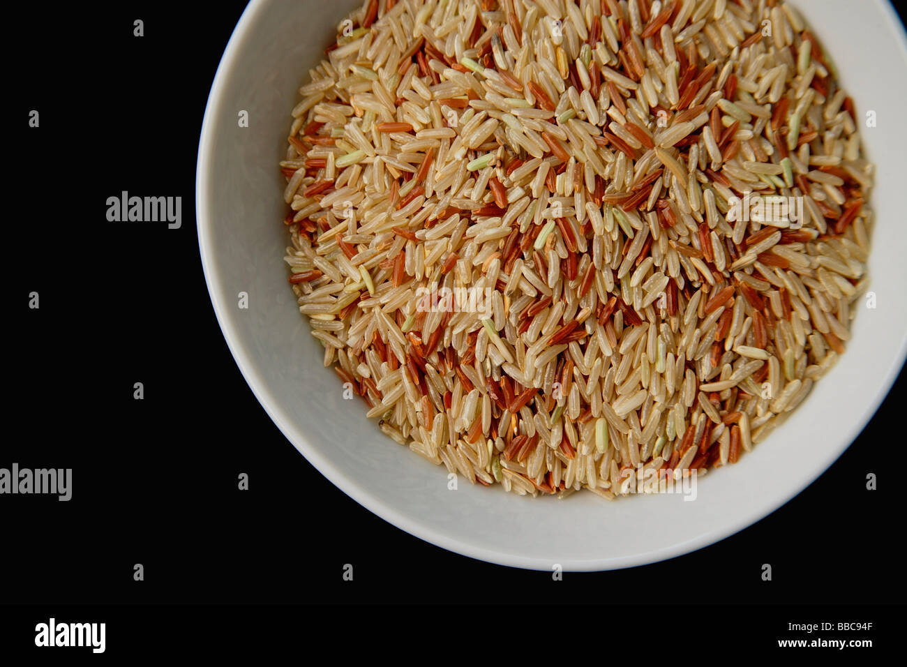 Raw uncooked rice in hi-res stock photography and images - Alamy