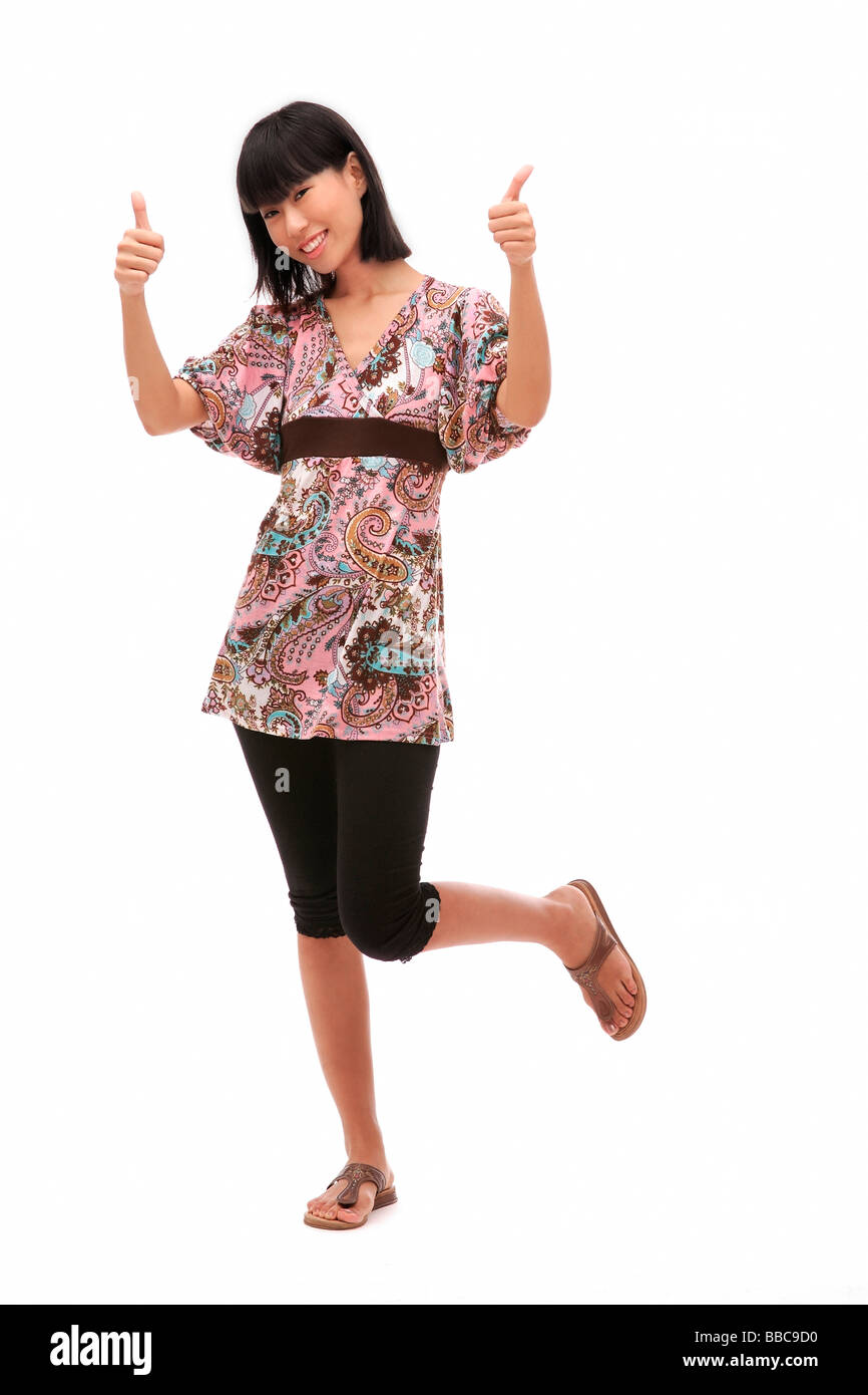 Woman making thumbs up sign hi-res stock photography and images - Alamy
