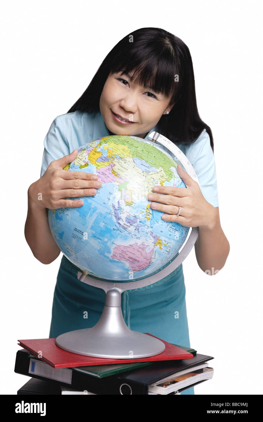 Holding hugging globe hi-res stock photography and images - Alamy