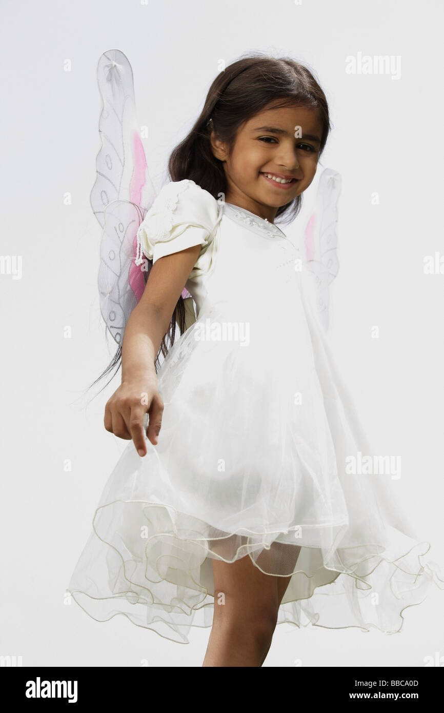 Girl in angel dress hi-res stock 