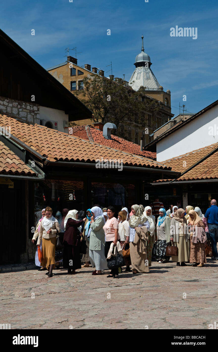 Muslim Bosniak women walking in Bascarsija district, the old town market sector in Sarajevo, Bosnia and Herzegovina Stock Photo