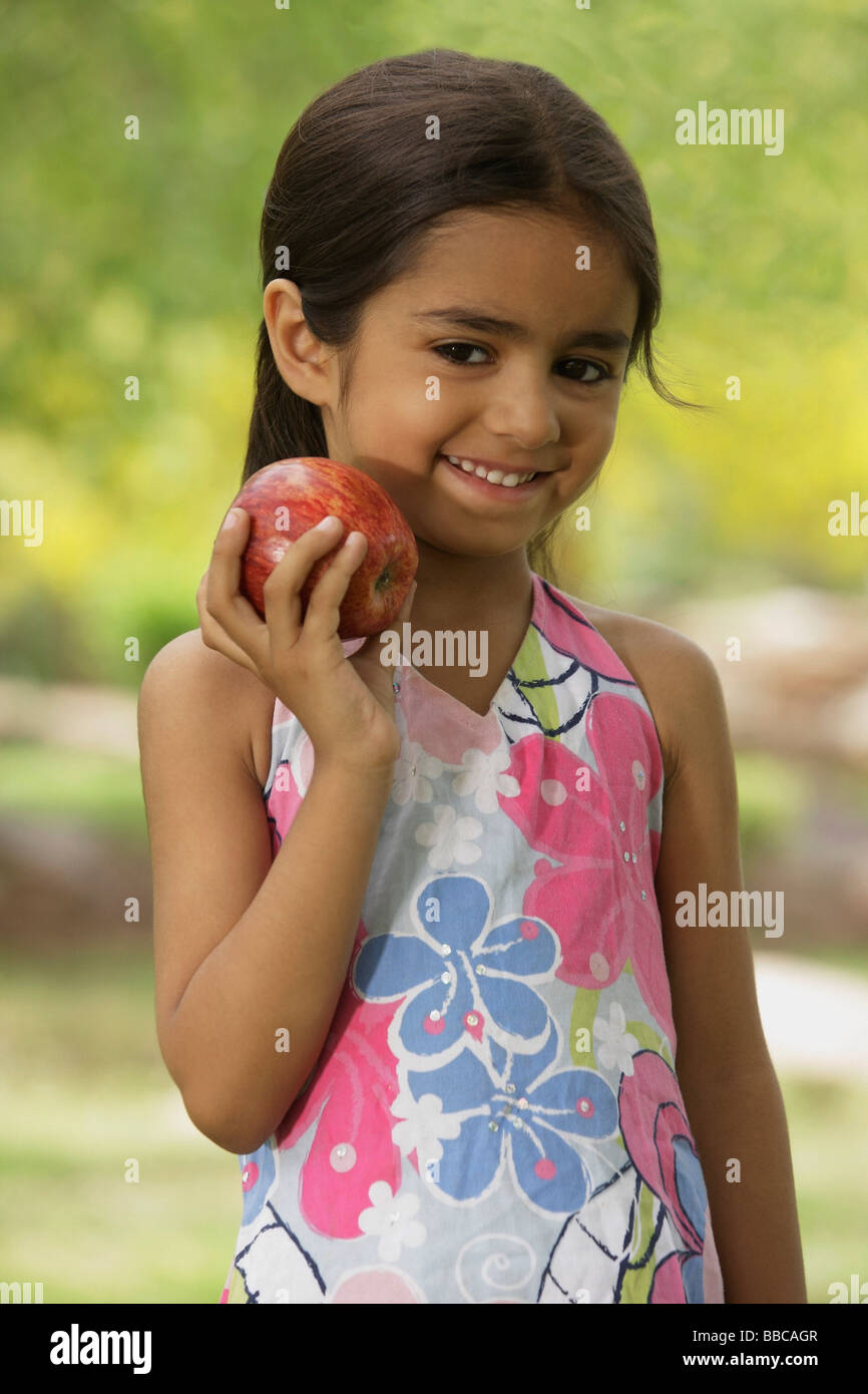 little girl with apple Stock Photo - Alamy