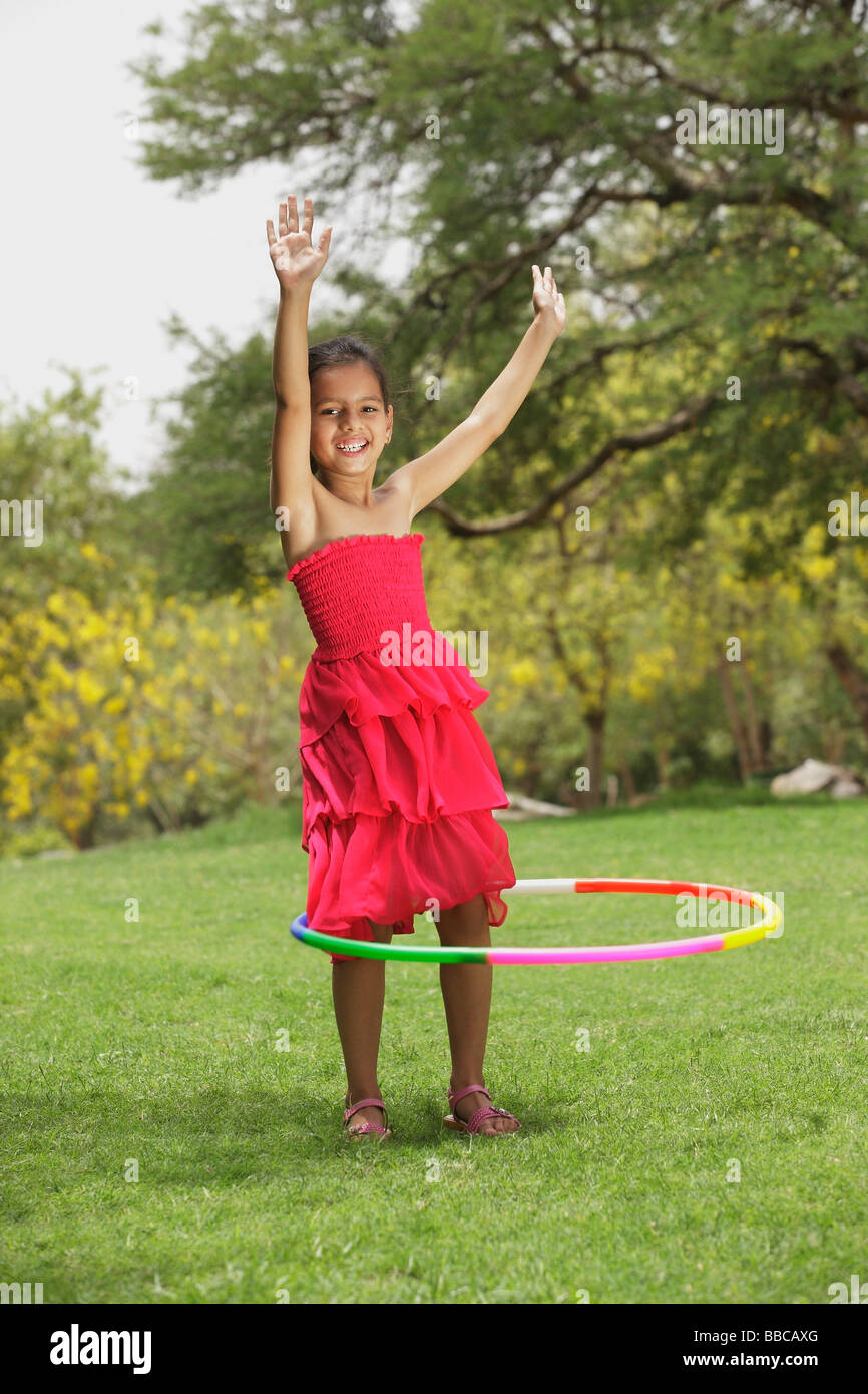 little girl with hula hoop Stock Photo Alamy
