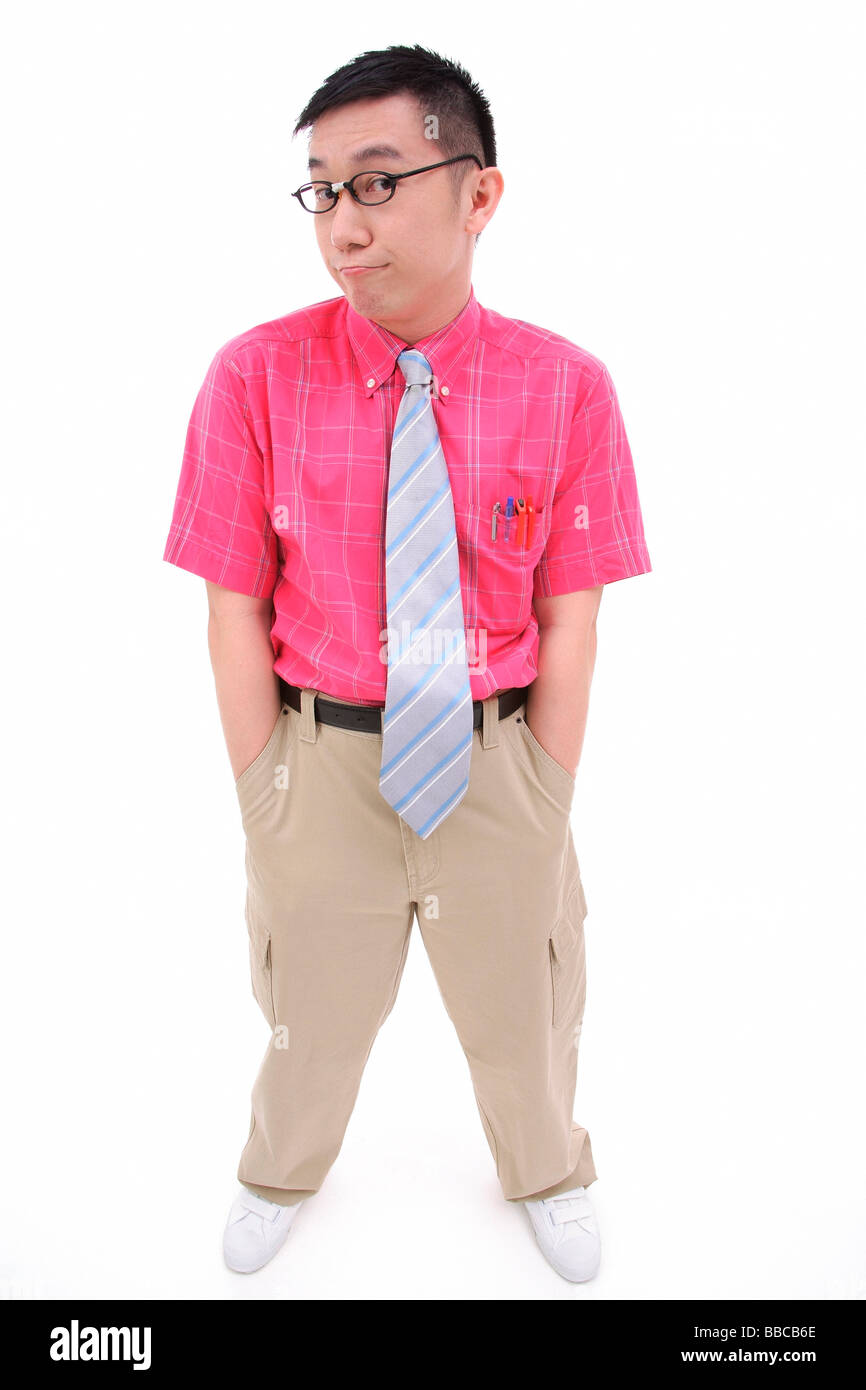 Man with hands in pocket, making face Stock Photo Alamy