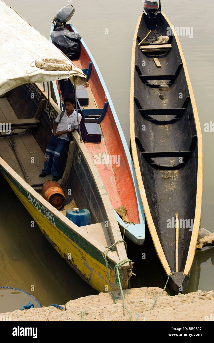 Long dugout canoes on Napo River - Coca (Puerto Francisco de Orellana), Ecuador Stock Photo