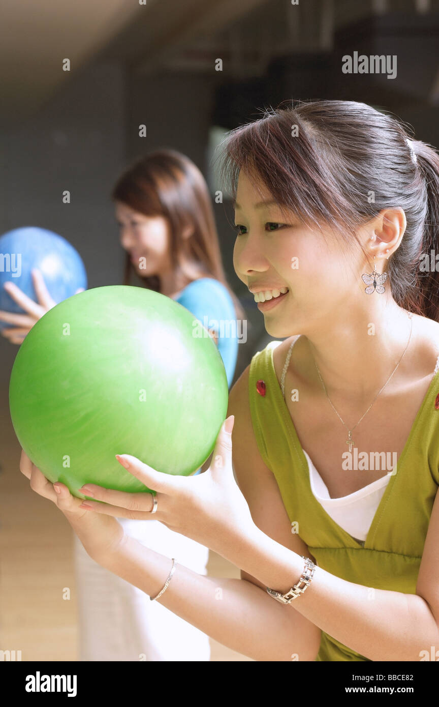 Two women with bowling balls hires stock photography and images Alamy
