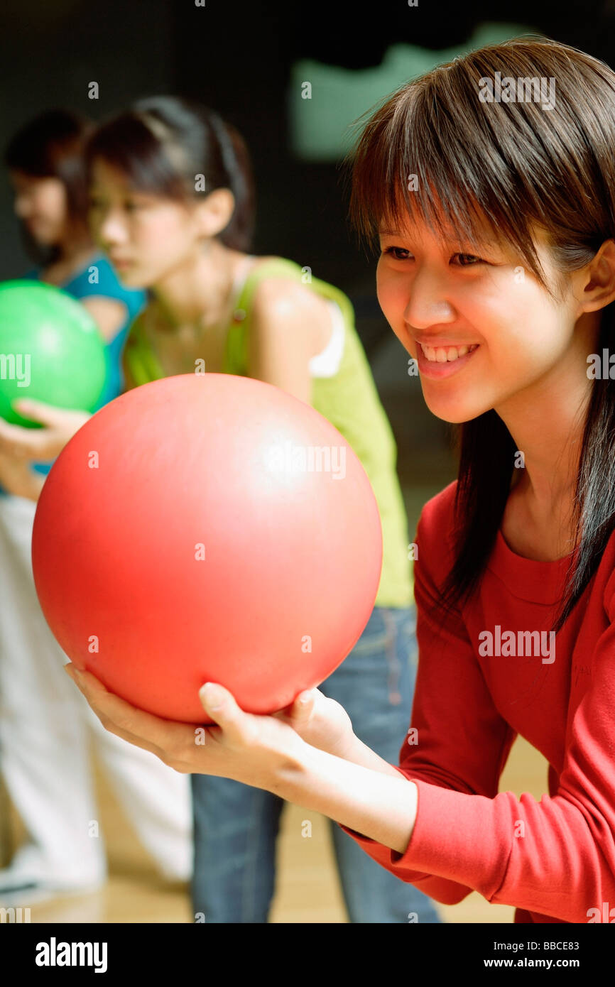 Three women with bowling balls hires stock photography and images Alamy