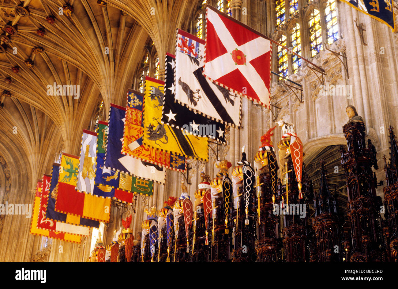 Banners of Knights of the Order of the Garter St George's Chapel Windsor Berkshire England UK interior choir banners flags interiors Stock Photo