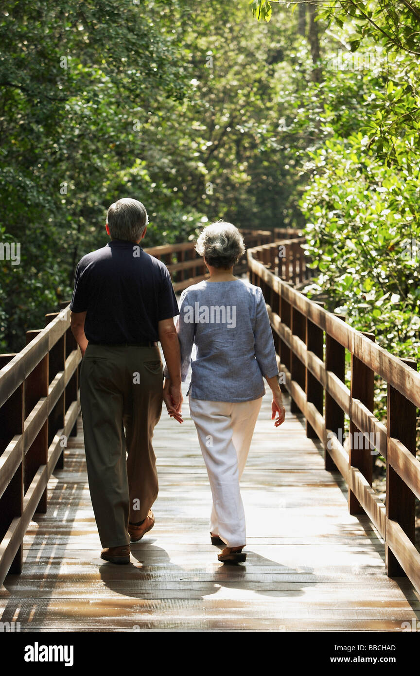 Man walking on bridge side view hi-res stock photography and images - Alamy