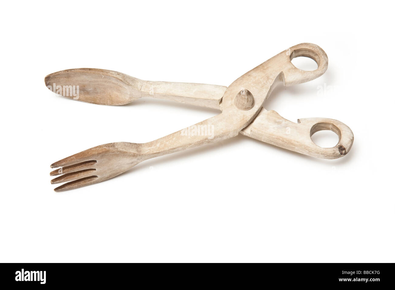 Wooden tongs isolated on a white studio background Stock Photo