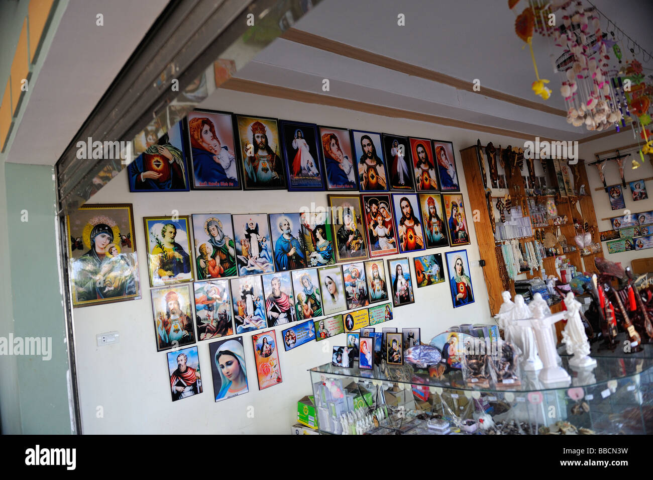 Catholic religious iconography in store. Vung Tau, Vietnam Stock Photo