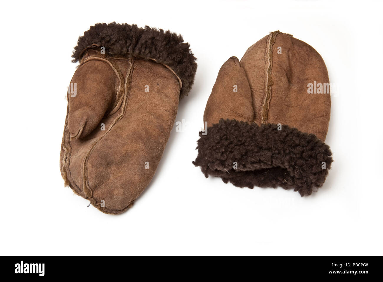 Sheepskin mittens or gloves isolated on a white studio background Stock ...