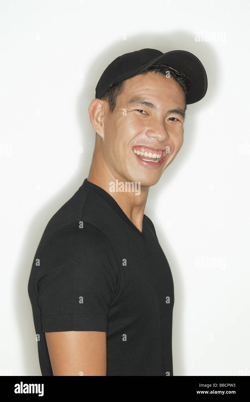 Young man looking at camera, smiling Stock Photo - Alamy