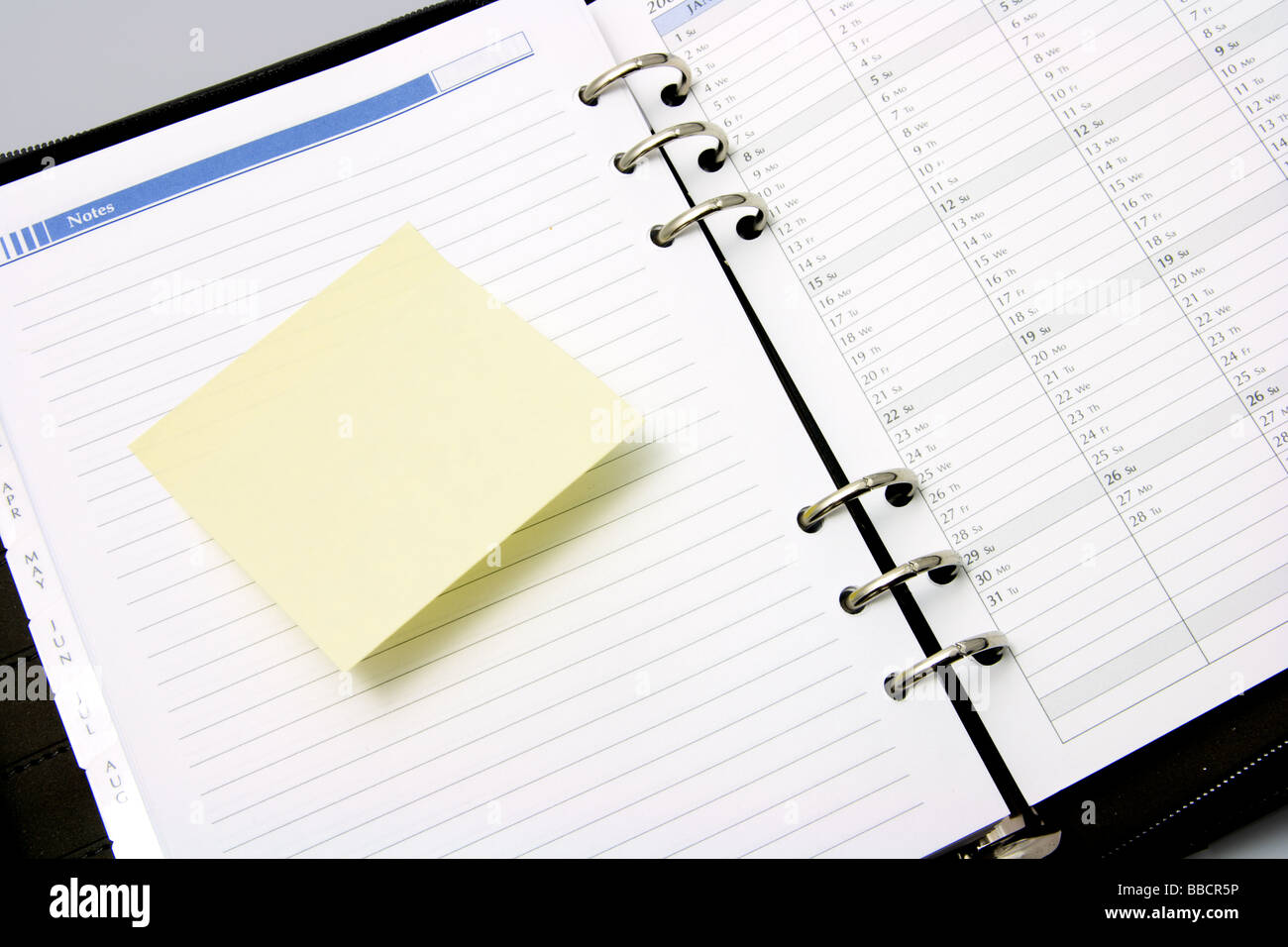 Post It Note on Pocket Organizer Stock Photo Alamy