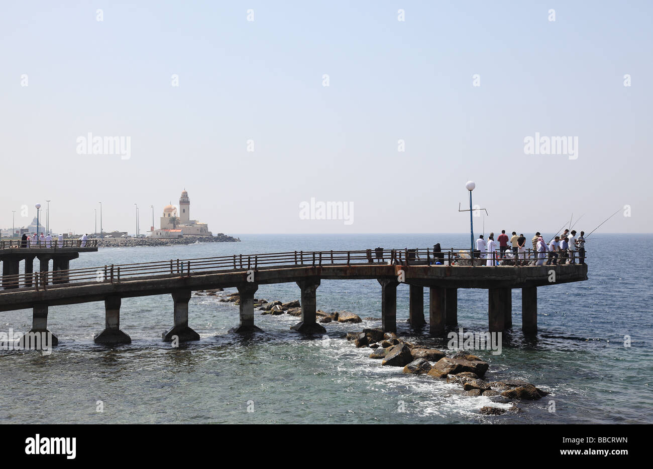 Men fishing from jetty Jeddah Saudi Arabia Stock Photo - Alamy