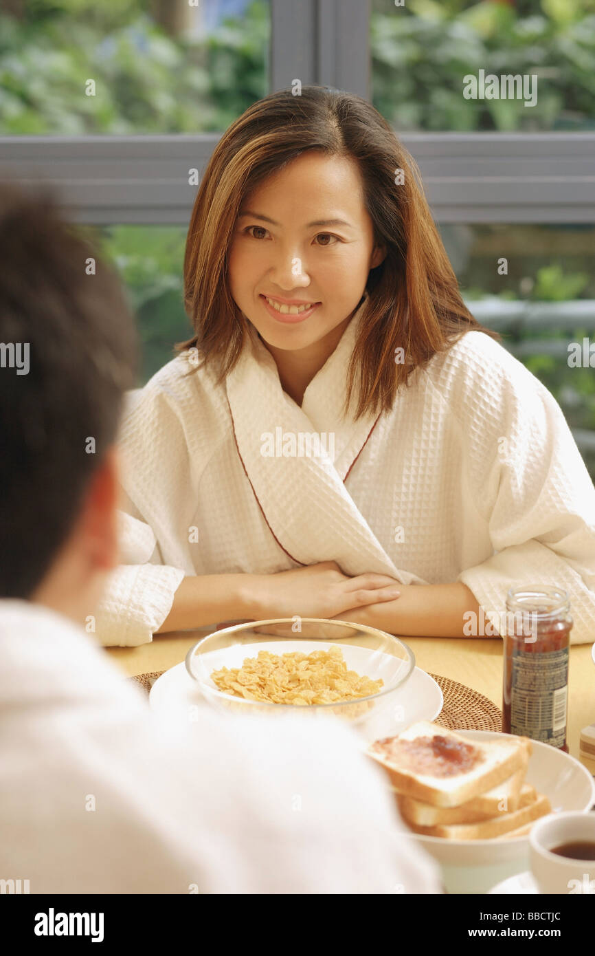 Couple sitting across from each other hires stock photography and