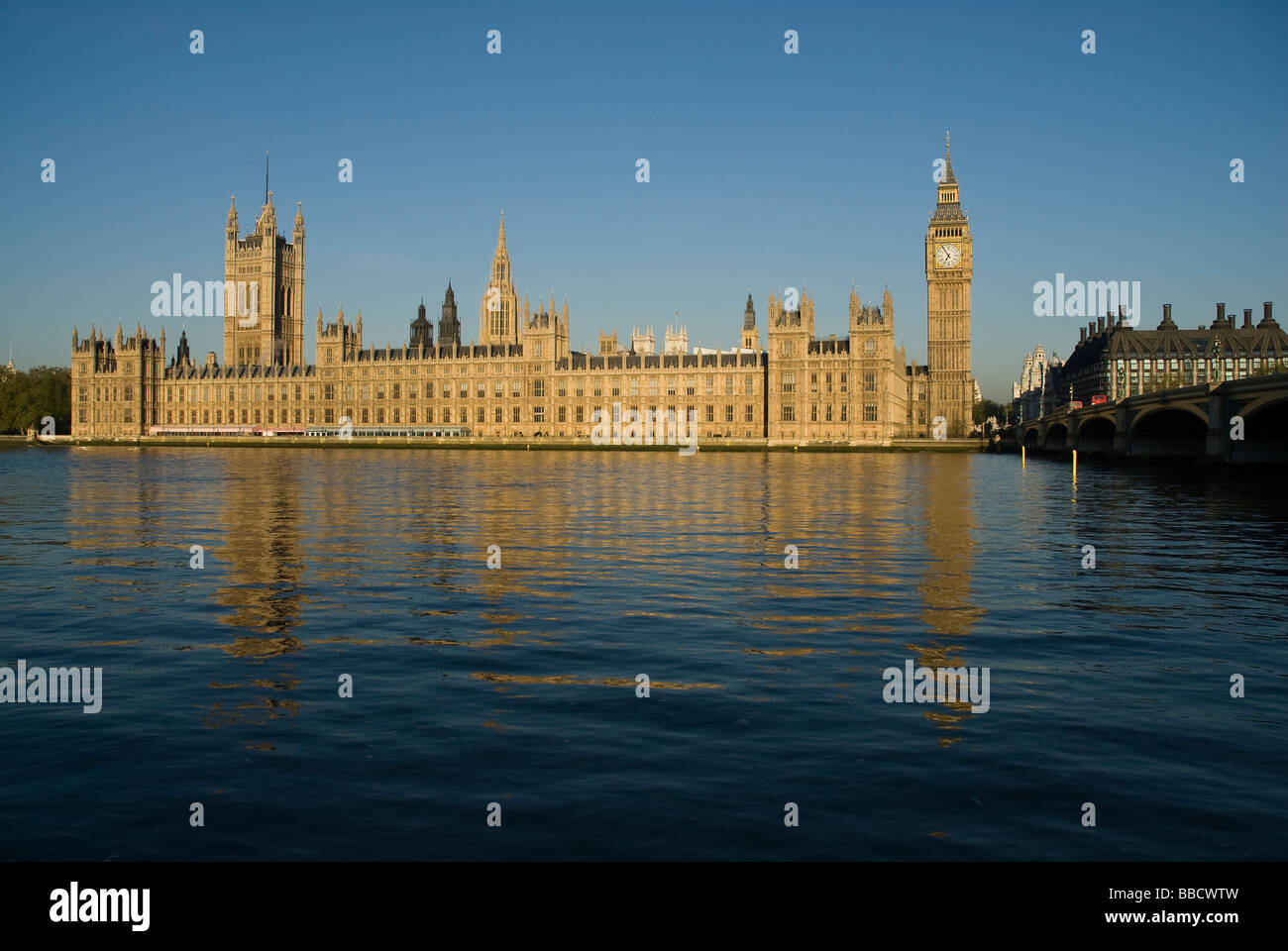 A view of the British Houses of Parliament as seen from the south bank of the River Thames London England Stock Photo