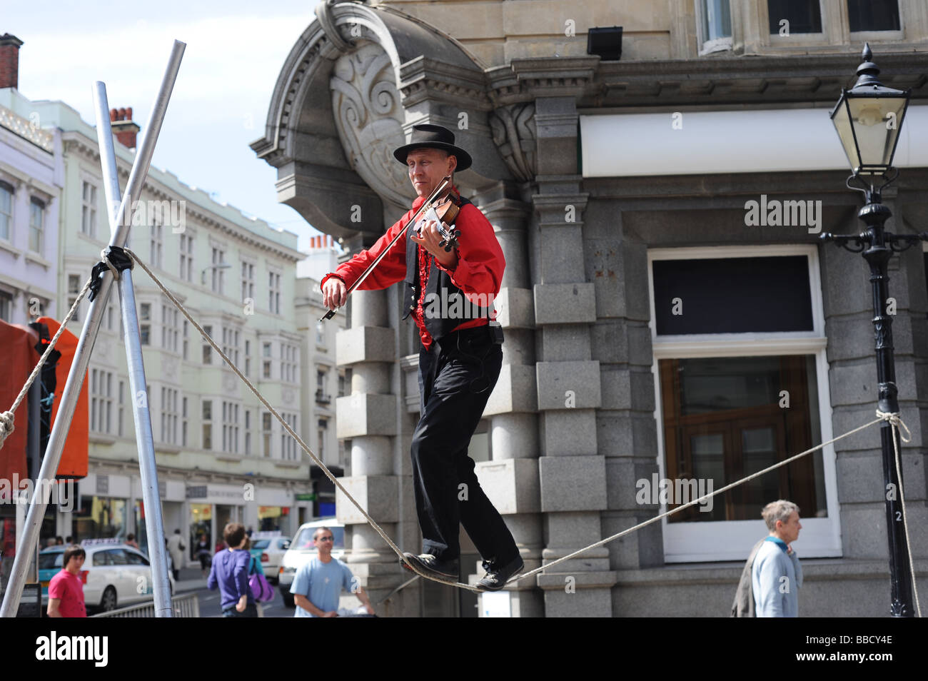 Tight Rope Playing Instruments Uk tightrope hi-res stock photography and images - Alamy