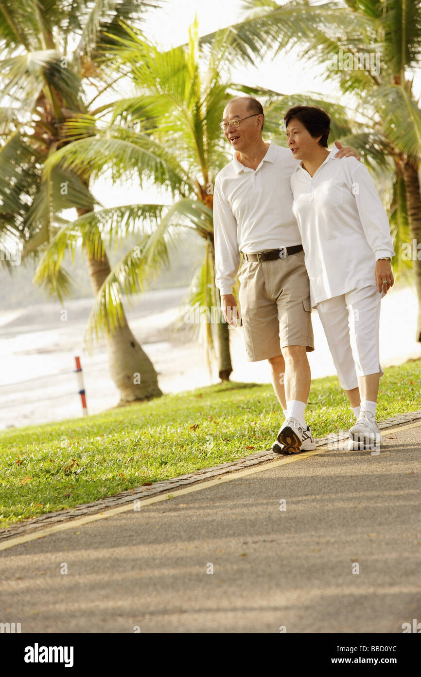 Happy senior chinese couple walking hi-res stock photography and images ...