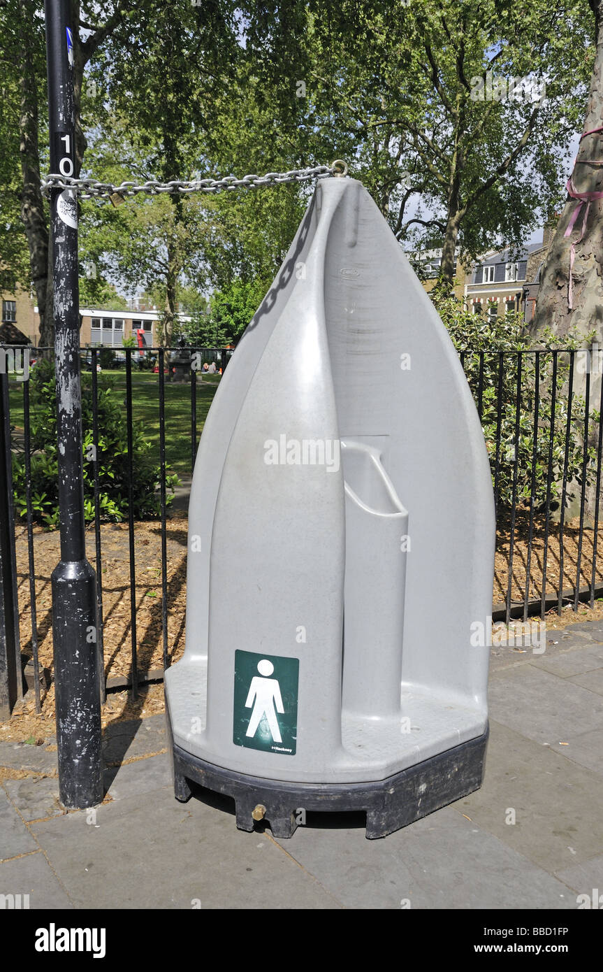 Portable urinal chained to post Hoxton Square Hackney London England UK Stock Photo