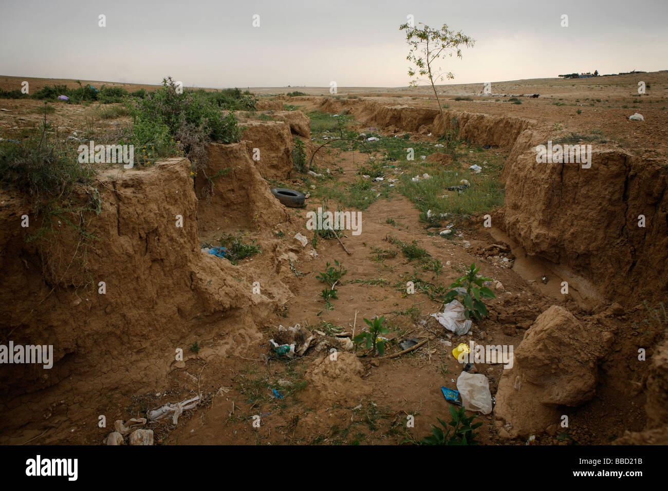 Rubbish discarded in Wadi ' Nam. Negev desert, Israel. Stock Photo