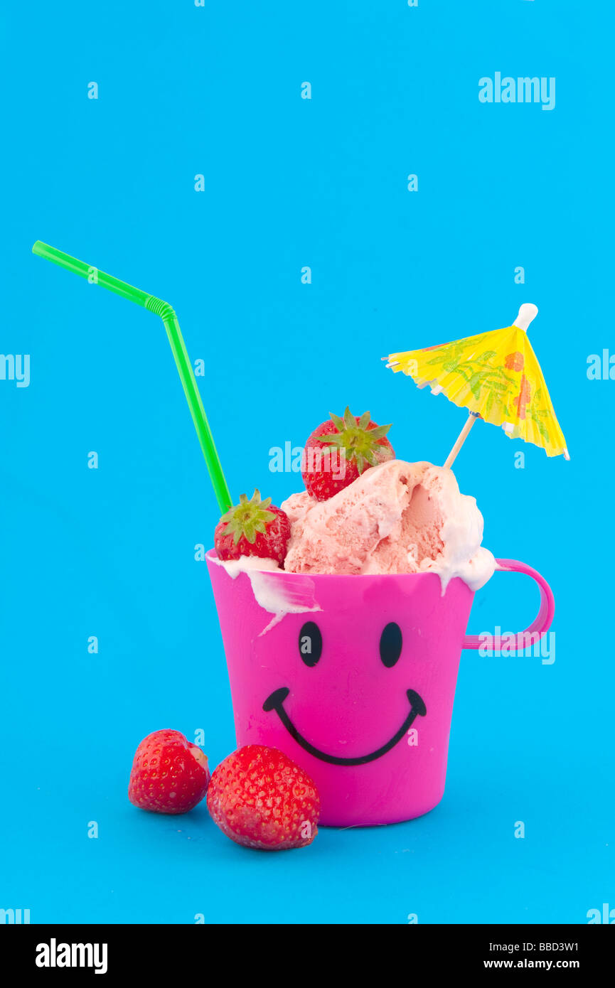 strawberry sorbet isolated over blue Stock Photo
